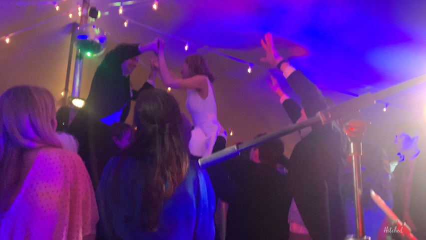 Packed dance floor at a wedding