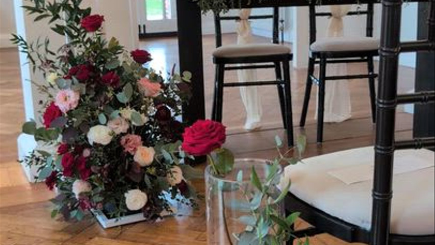 Ceremony room flowers at Sant Ffraed House