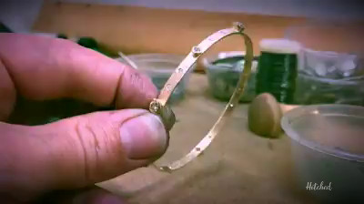 Handling a gem encrusted bracelet