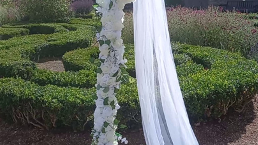 White floral ceremony arch 