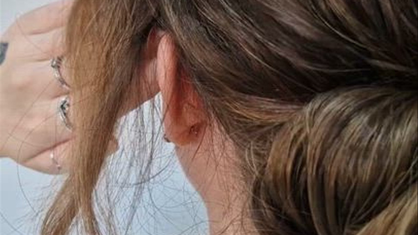 Low bun with slight texture