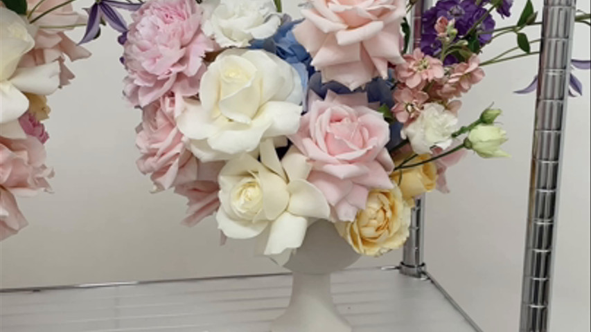 Pastel Table Centrepieces for a sky high Engagement Party