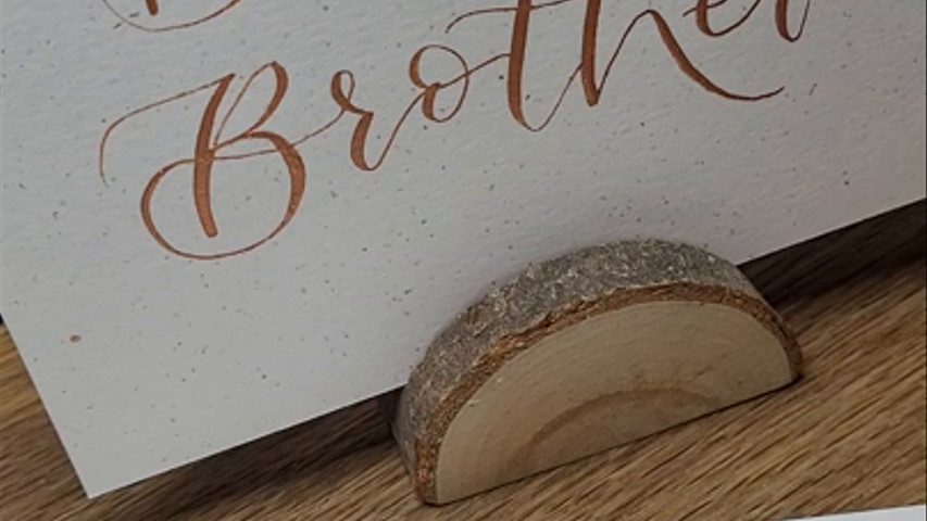 Copper narrow place cards to go into pinecones