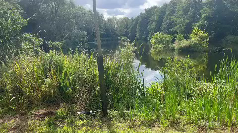 A little snapshot of two tipis beside the lake during a wedding 