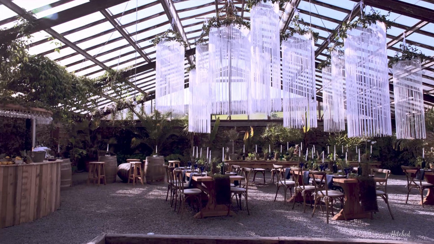 THE GLASS HOUSE's botanical-themed wedding set-up.