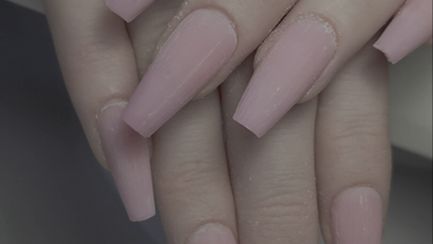 Nail extensions in natural pink