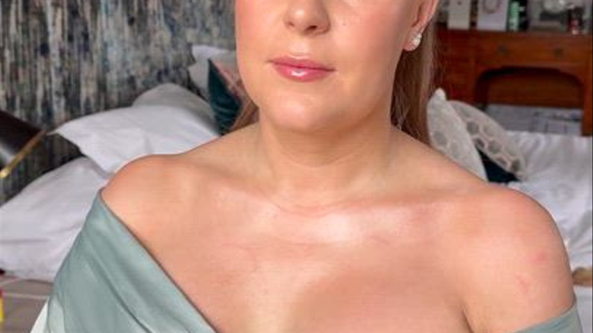 Glowy natural skin and half up half down hair 