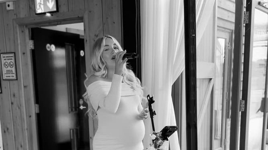 8 1/2 months pregnant and still performing for my beautiful brides!