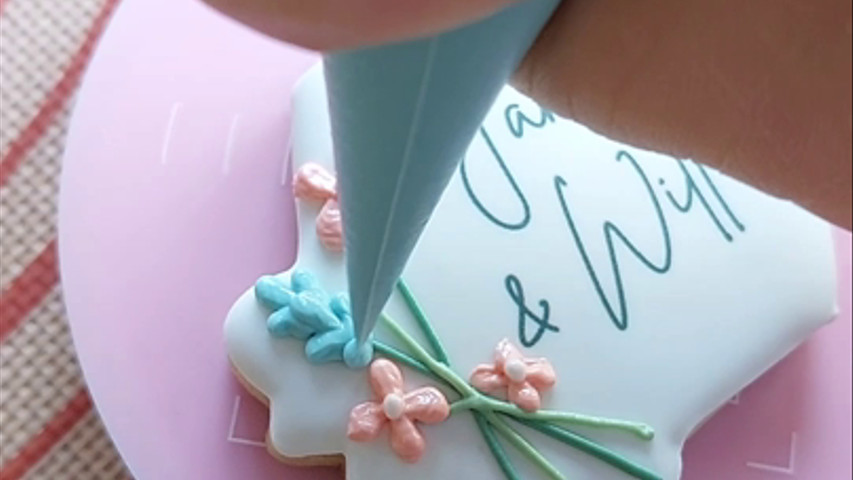 Hand piped wedding favour biscuits